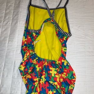 Dolphin uglie autism awareness suit